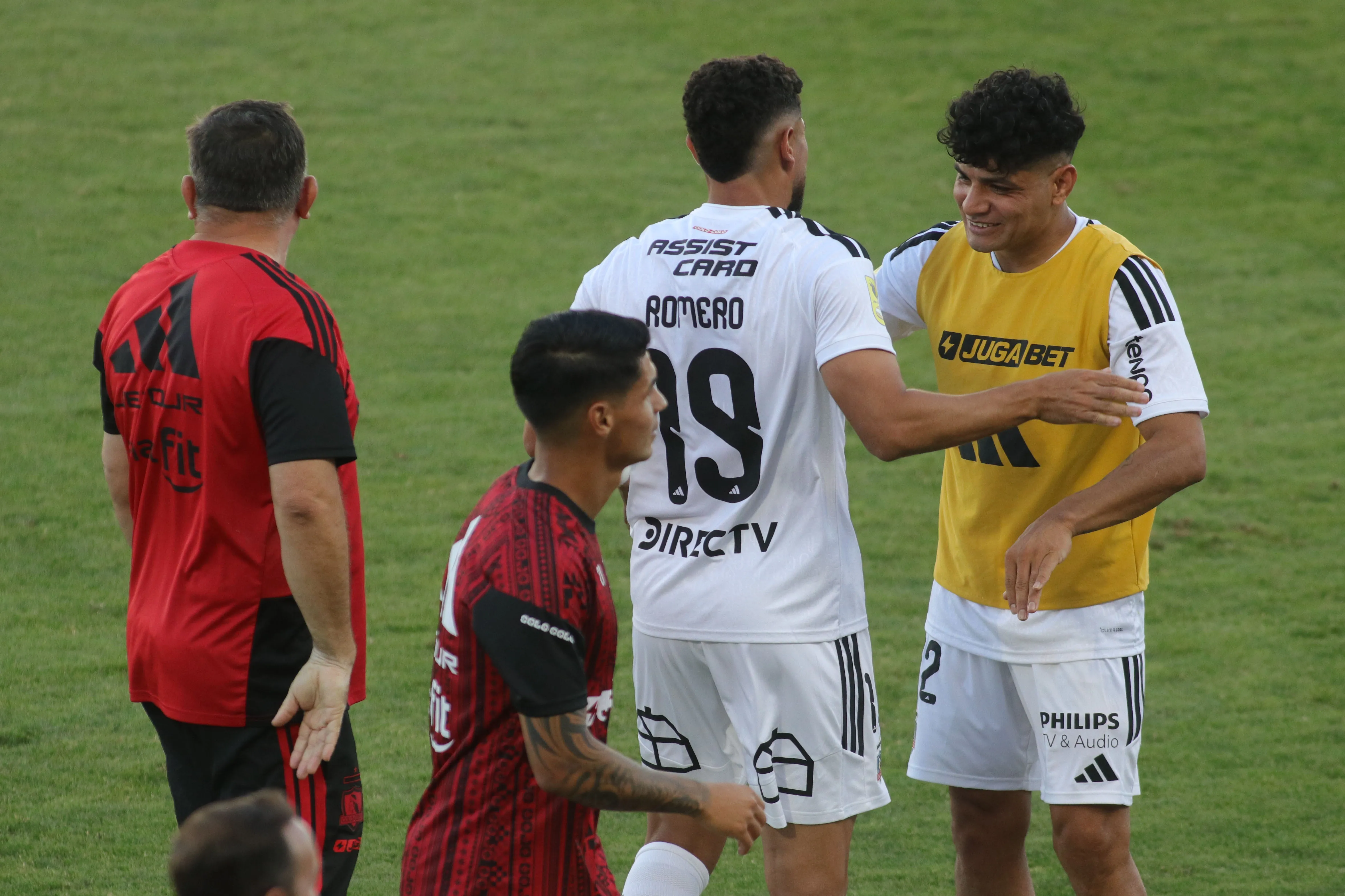 Claudio Aquino y Maxi Romero celebran ante O’Higgins. (Jorge Loyola/Photosport).