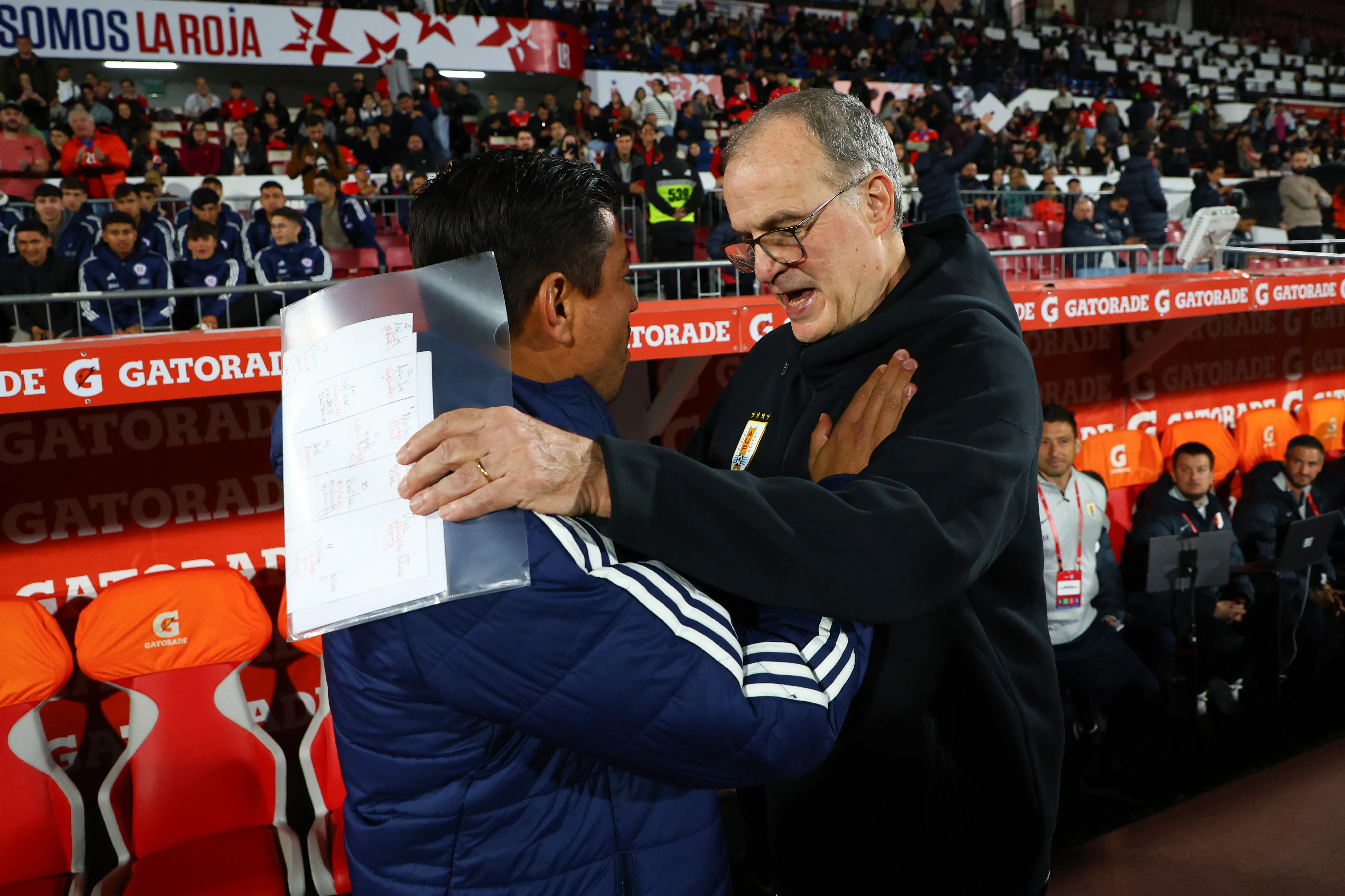 Nico Córdova con un ex DT de Chile | Getty Images