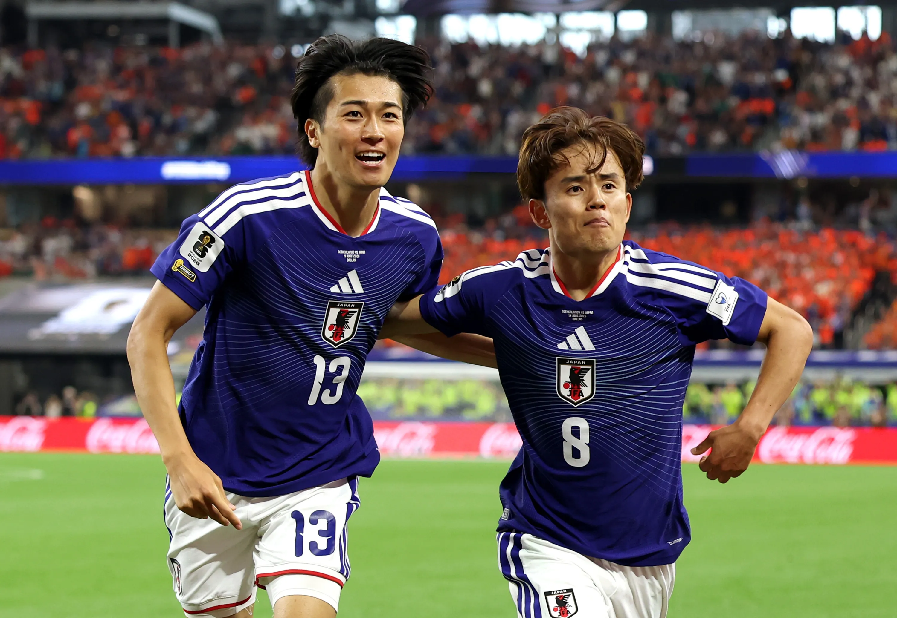 Kubo celebra con Nakamura en el empate ante Países Bajos | Getty Images