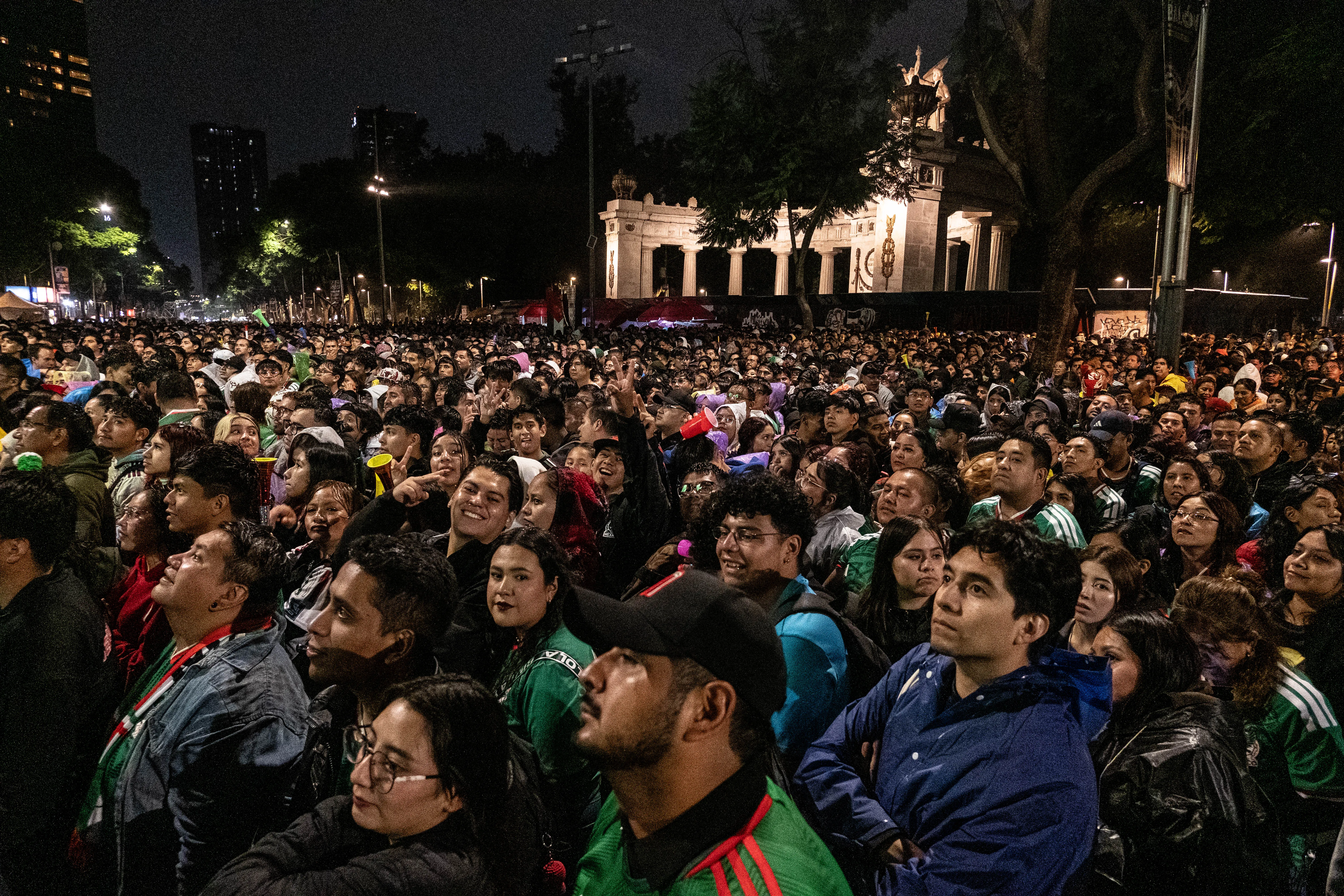 MEXICO CITY, MEXICO – JUNE 30: Fans watch the game near the Palace of Fine Arts during the Mexico v Ecuador match on June 30, 2026 in Mexico City, Mexico. (Photo by Hector Quintanar/Getty Images)