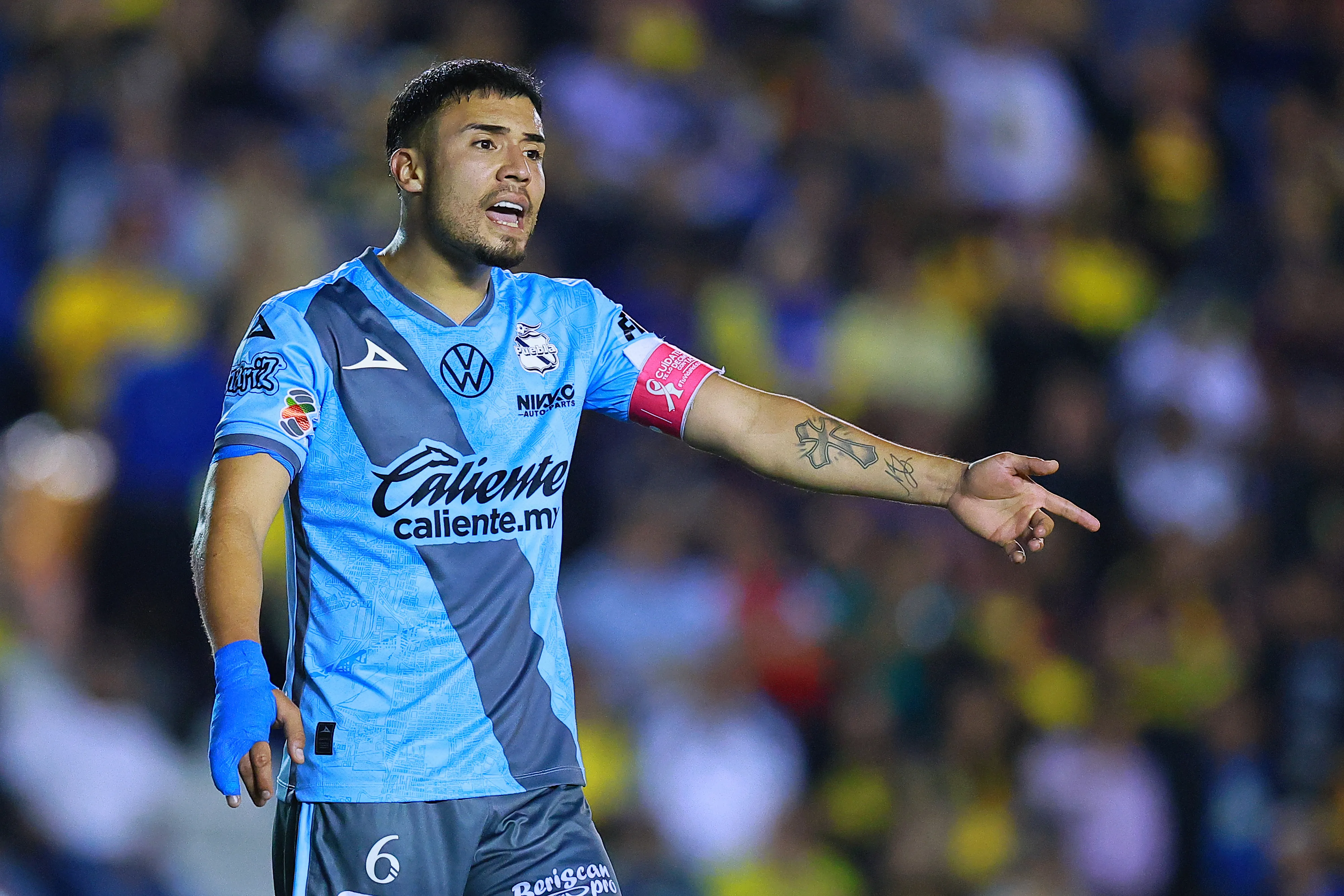 Nicolás Díaz llegó a ser capitán en el Puebla de México. (Manuel Velasquez/Getty Images).