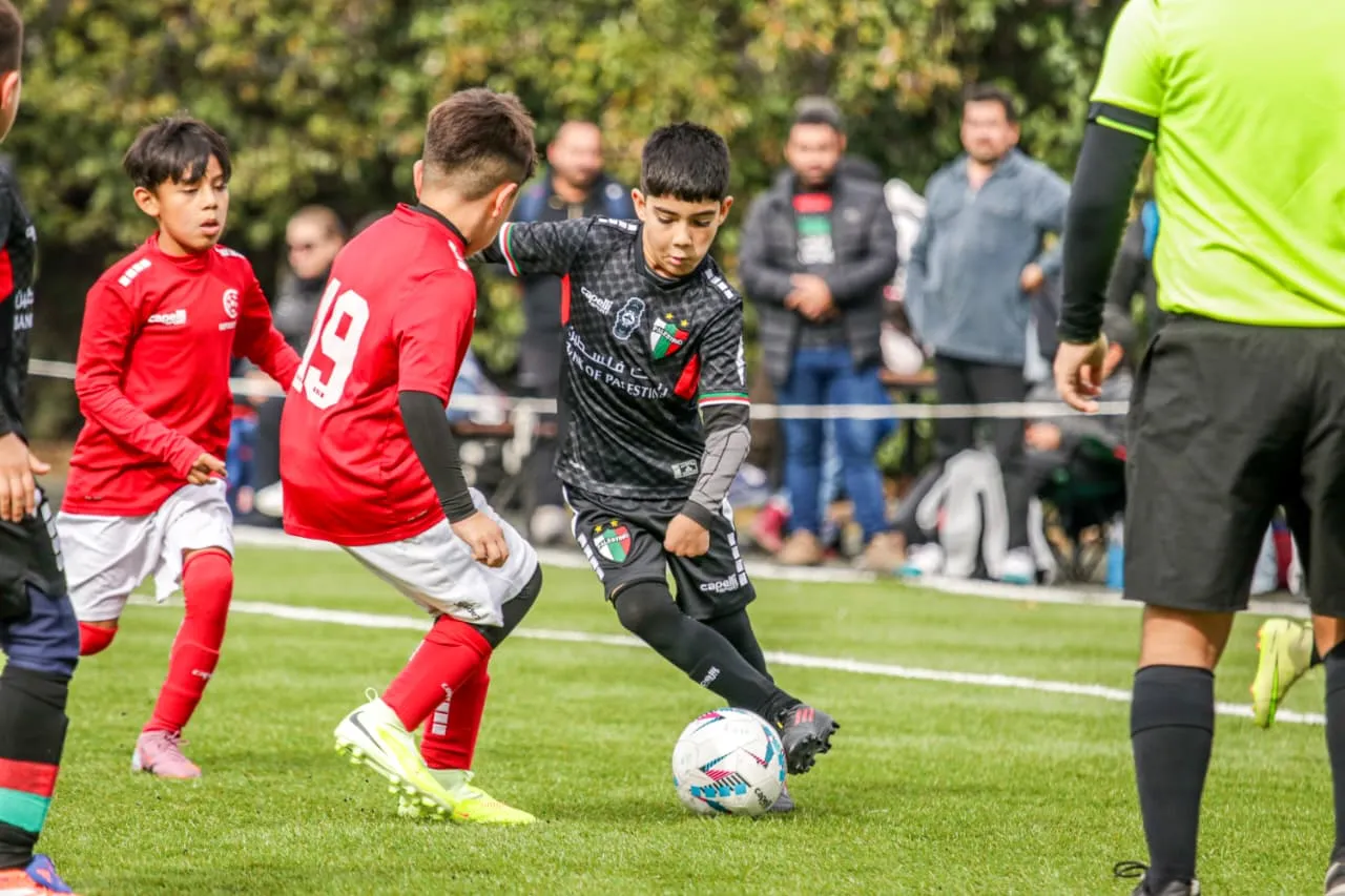 Los niños juegan en la Liga de Promoción