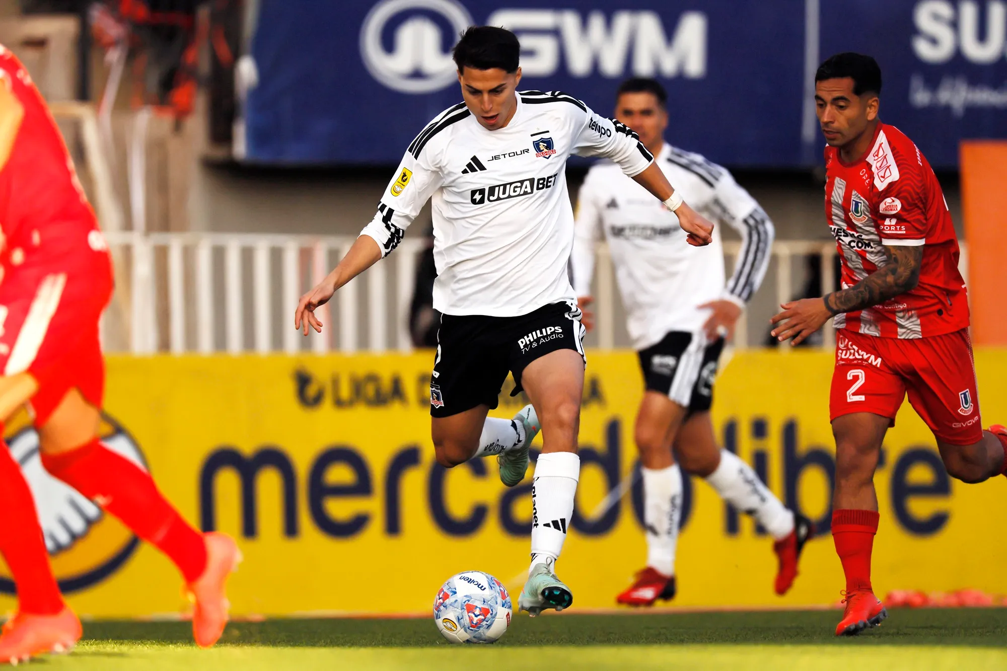 Jonathan Villagra en acción ante Unión La Calera en la fecha 18. (Andres Pina/Photosport).