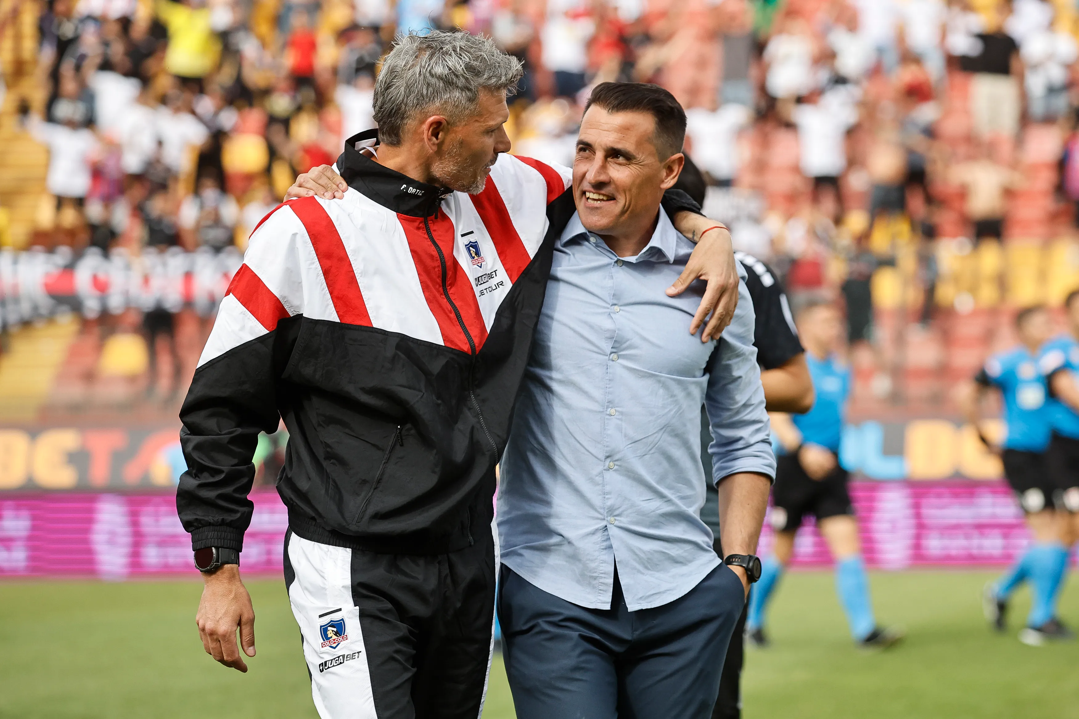 Otra imagen de Farré y Ortiz antes de comenzar el partido. (Diego Martin/Photosport).